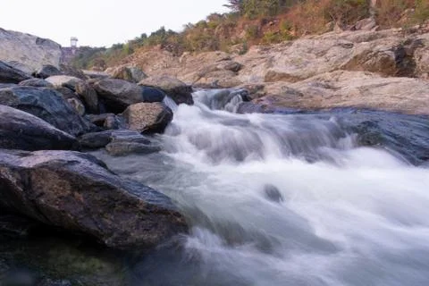 High shutter speed image of flowing white water Stock Photos