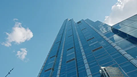 High skyscraper low angle dolly looking up modern architecture office building Video stock 240046371
