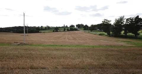 High Speed Aerial Shot Empty Field Video stock 79546336