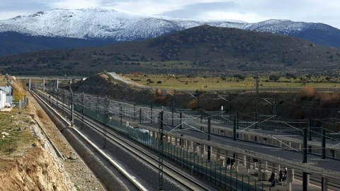 High-speed Ave Renfe train slowly pulls into Segovia train station. Spain Stock Footage 121122417