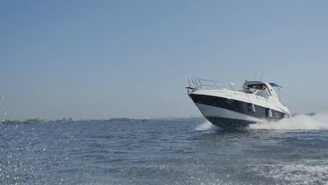 High-speed Boat Dissects Waves Stock Footage 87972026