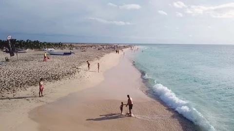 High Speed Camera Moves above the beautiful beach Stock Footage 117353680