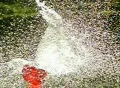 High Speed Camera : Water Balloon Explosion - Orange (400fps) Web Footage