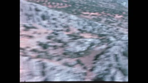 High speed combat flight over the mountains in the 1950s from military pilot POV Stock Footage 212014475