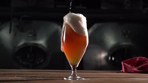 High Speed Craft Beer Pour Captured at 1000 Fps Showcasing Foam and Bubbles in Stock Footage 324832064