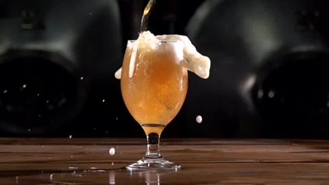 High Speed Craft Beer Pour Captured at 1000 Fps Showing Foam and Bubbles in Stock Footage 324860507