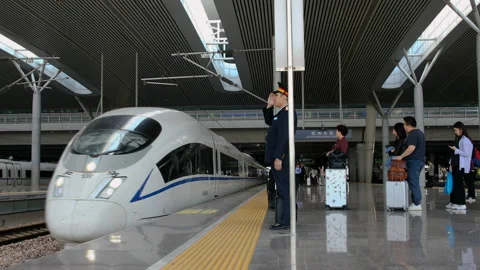 High-speed CRH bullet train approaching platform Stock Footage 140480020