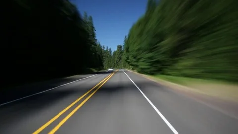 High-speed driver's POV of forest-lined Highway 126, near McKenzie Bridge, OR Stock Footage 81194935