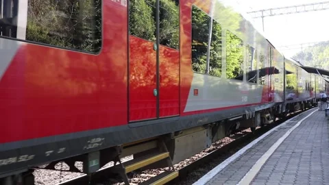 High speed electric express train (EMU), based on design at railway station, Stock Footage 276363457