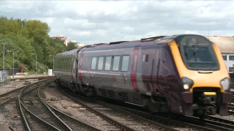 A High Speed Express Train Arriving at a Station Vidéo 254572470