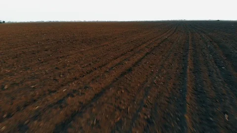 High-speed Flight Above Plowed Field 库存影片 106952118