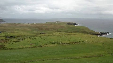 High speed fly over coastal meadows on the Isle of Skye Stock Footage 116048978