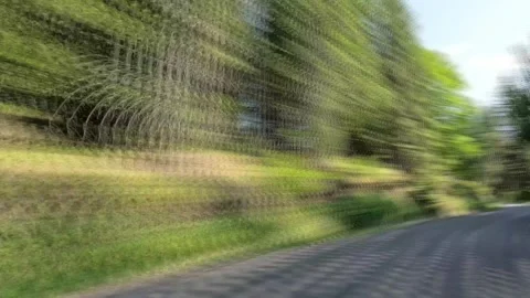 High-speed hyperlapse on winding forest road Stock Footage 247732126