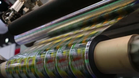 High speed labeling machine in industrial factory. Machine for sticker on produc Stock Footage 91769106