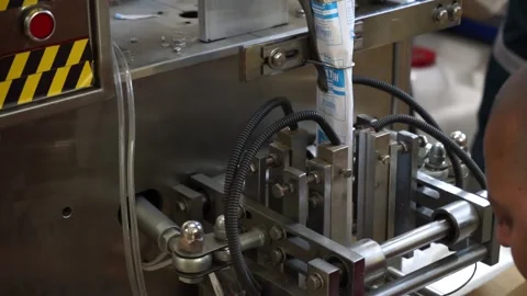 High speed labeling machine in industrial factory Video stock 137404372