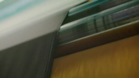 High speed machine working on fabric Stock Footage 143774509