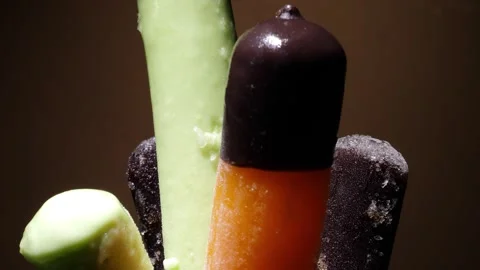 High speed melting of popsicle ice cream time lapse Stock Footage 264470923