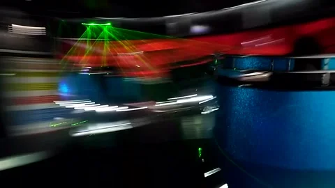 High-Speed Motion Blur from Amusement Ride at Night, Derby, England, UK Stock Footage 345365388