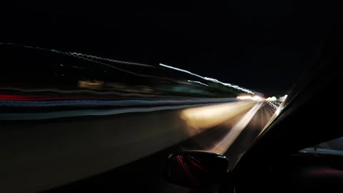 High-speed motion  light trails in time lapse captured from a moving vehicle Vídeos de archivo 346115979