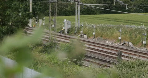 High speed passenger train passing Vídeos de archivo 137467846