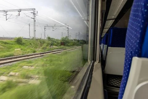 High Speed Passenger Train Window View in Motion During Daytime with motion.. Stock Photos