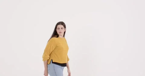 High-speed photography for dynamic scenes, walking and looking concerned, woman Stock Footage 345650965
