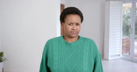 High speed photography for dynamic scenes, person in green sweater making funny Stock Footage 345714333