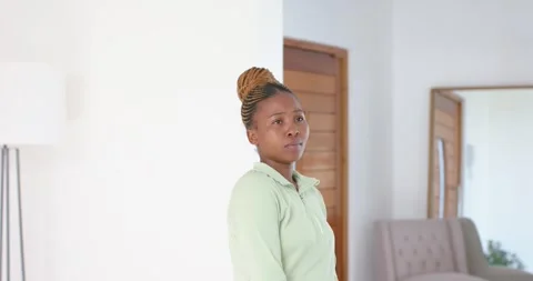 High-speed photography for dynamic scenes, thinking deeply, woman in green Stock Footage 345802376