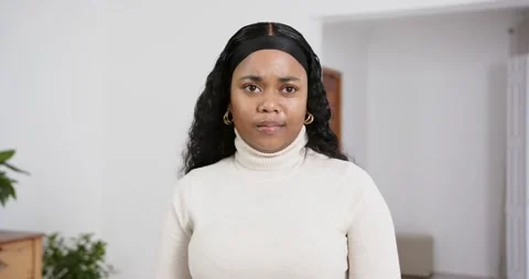 High speed photography for dynamic scenes, woman in turtleneck sweater standing Stock Footage 346284101