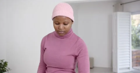 High speed photography for dynamic scenes, hearing pink sweater and beanie, Видео 346597184