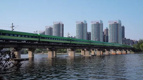 High speed railway train in motion China Railway Harmony Railway Elevated Touris Stock Footage 243038505