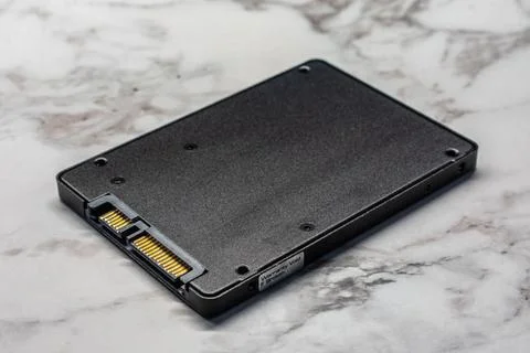 High-Speed SATA SSD Solid State Drive with Top-View Close-Up on White Backg.. Stock Photos
