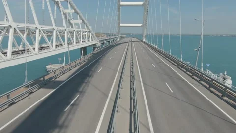 High-speed span over the Crimean Bridge road Stock Footage 230155896