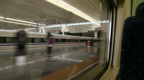 High speed train arriving at railway station Vídeos de archivo 53545394