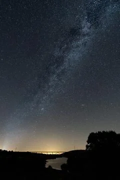 High speed train bridge, river and milky way, vertical composition Stock-Fotos