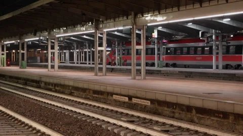 High speed train departing from platform at night Venice Mestre station Video stock 325607636