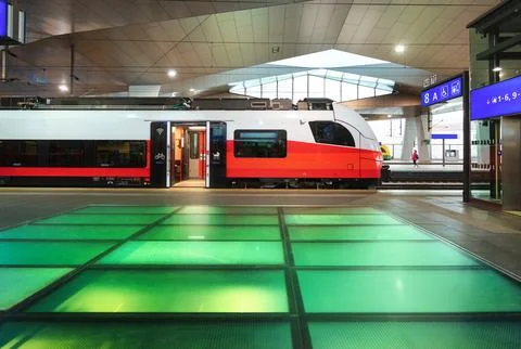 High speed train inside beautiful train station in Vienna, Austria. Red mod.. Stock Photos