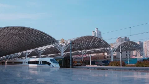 A High-speed train leaves the train station platform. 4K Stock Footage 108859104