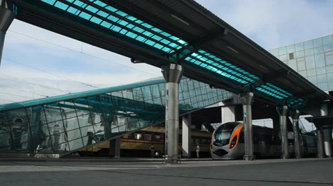 High-speed train leaving the platform. Moving camera Stock Footage 34836533