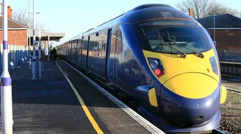 High speed train leaving the railway station Stock Footage 10733597