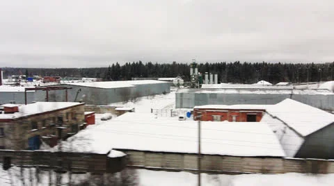 High-speed train is moving close to the warehouse area (POV) Stock Footage 23012311