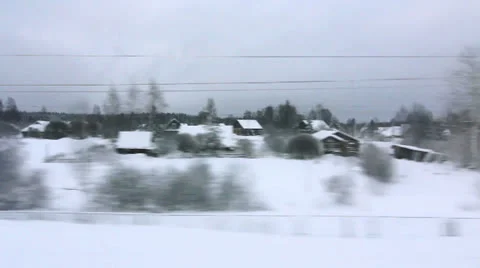 High-speed train is moving quickly past small villages (POV) Stock Footage 23012350