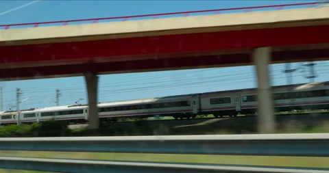 High-speed train moving through Spanish landscape Stock Footage 264928278