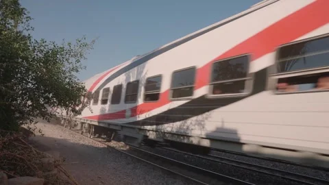 High speed train passing camera with dust and shake - Egypt Stock Footage 311608008