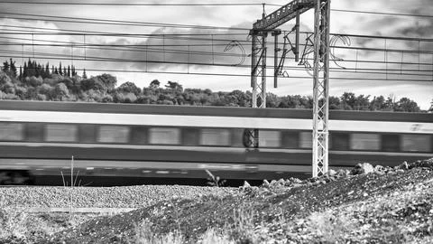 High-Speed Train Passing by Construction Site Stock Photos