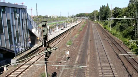 High-speed train passing by a small railway station without sound. Germany Stock Footage 43299033