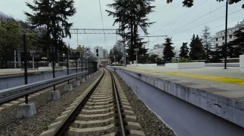 High-speed train rides the rails to the resort on the Black Sea Coast Stock Footage 58109959