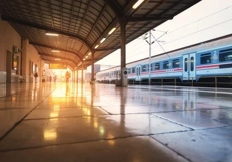 High speed train on train station at beautiful sunrise in Zagreb, Croatia. .. Stock Photos