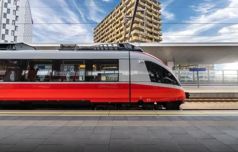 High speed train on the train station at sunset in Vienna Stock Photos