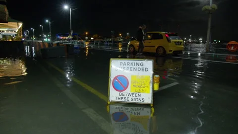 High spring tide causes flooding to town seafront at St Peter Port, Guernsey Stock Footage 254410244